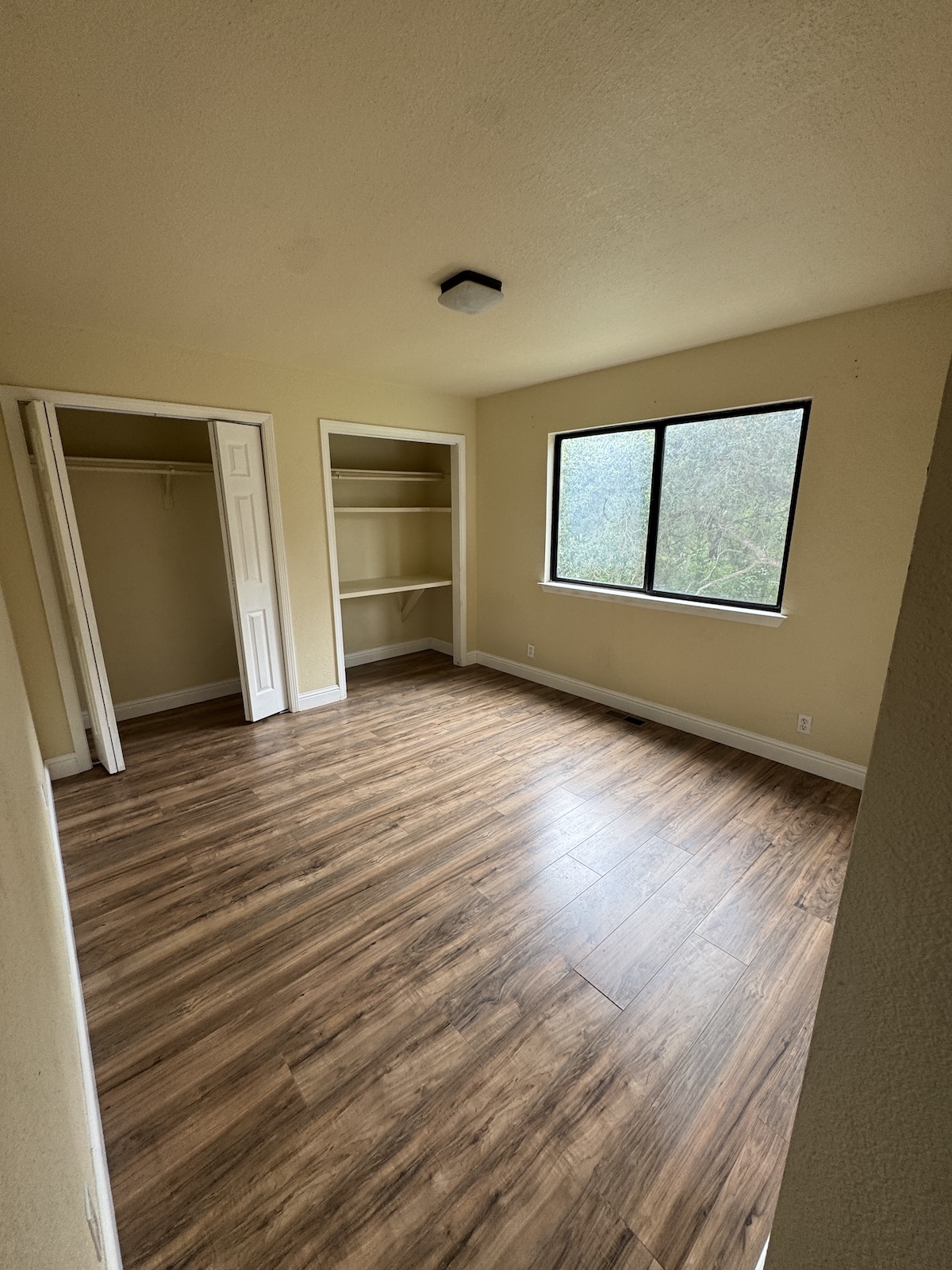 The Master Bedroom is 11 x 12 with two closets.