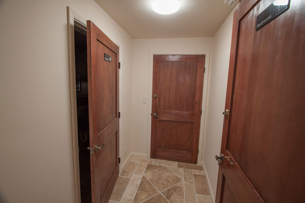 Hallway to restroom and storage.