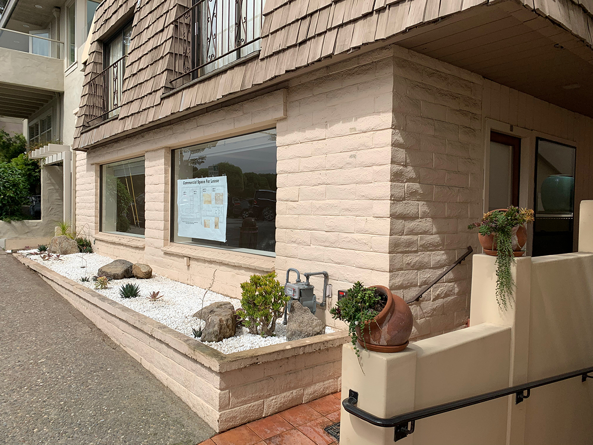 Building front—signage allowed with permit.