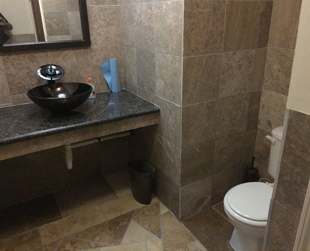 Shared bathroom (building lower level).