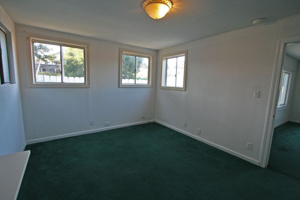 The second bedroom is also large and loaded with closet space.