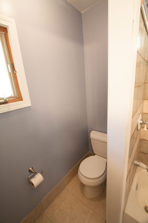 Toilet room at the end of the bath.