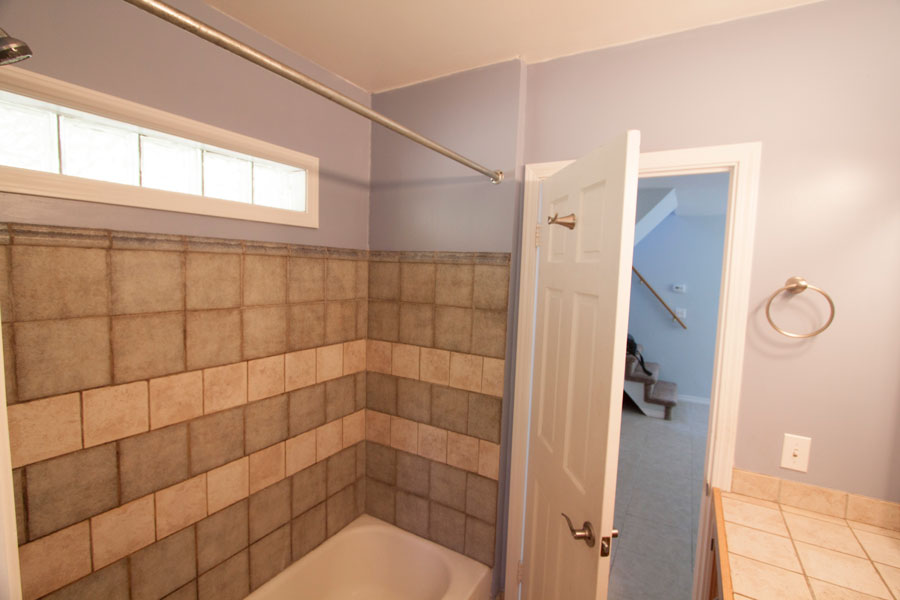 Bathtub with shower.