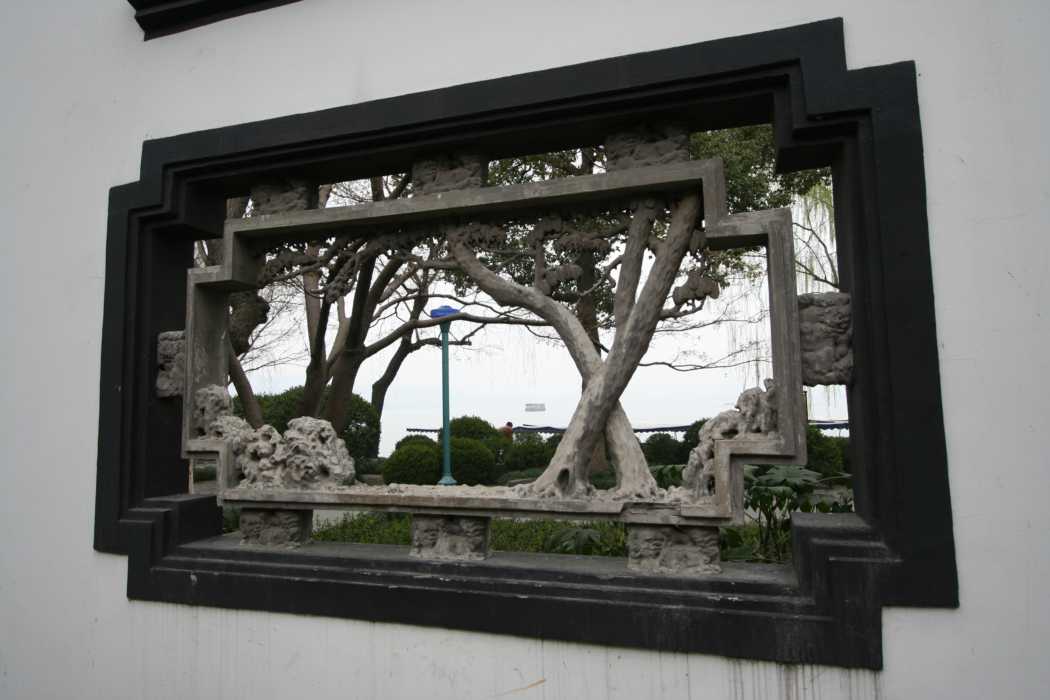 Window in lakeside wall