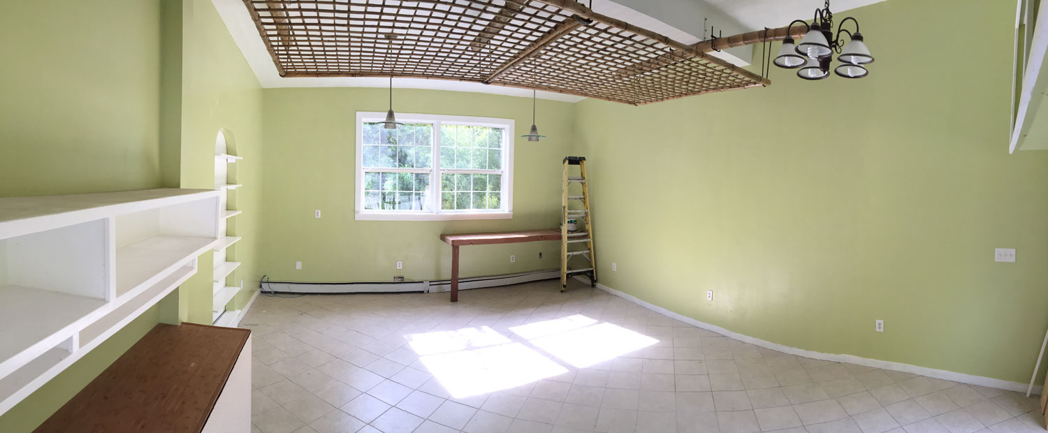 View toward entry, showing outlets and finished floor.