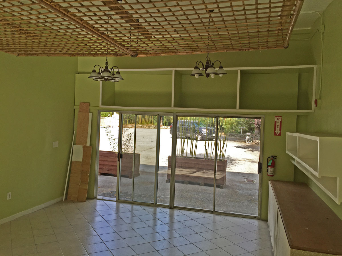 Another corner of Bay 3 — open floor plan with high ceilings.