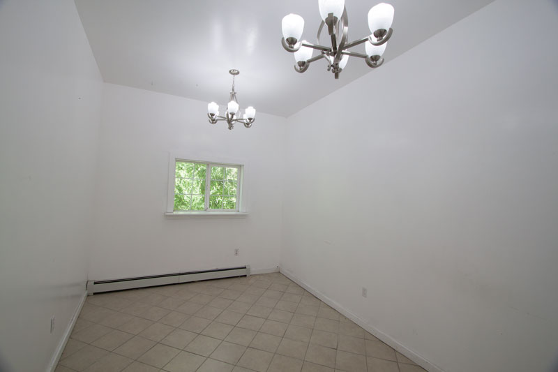 Another view of Bay 8 showing sliding glass entry.