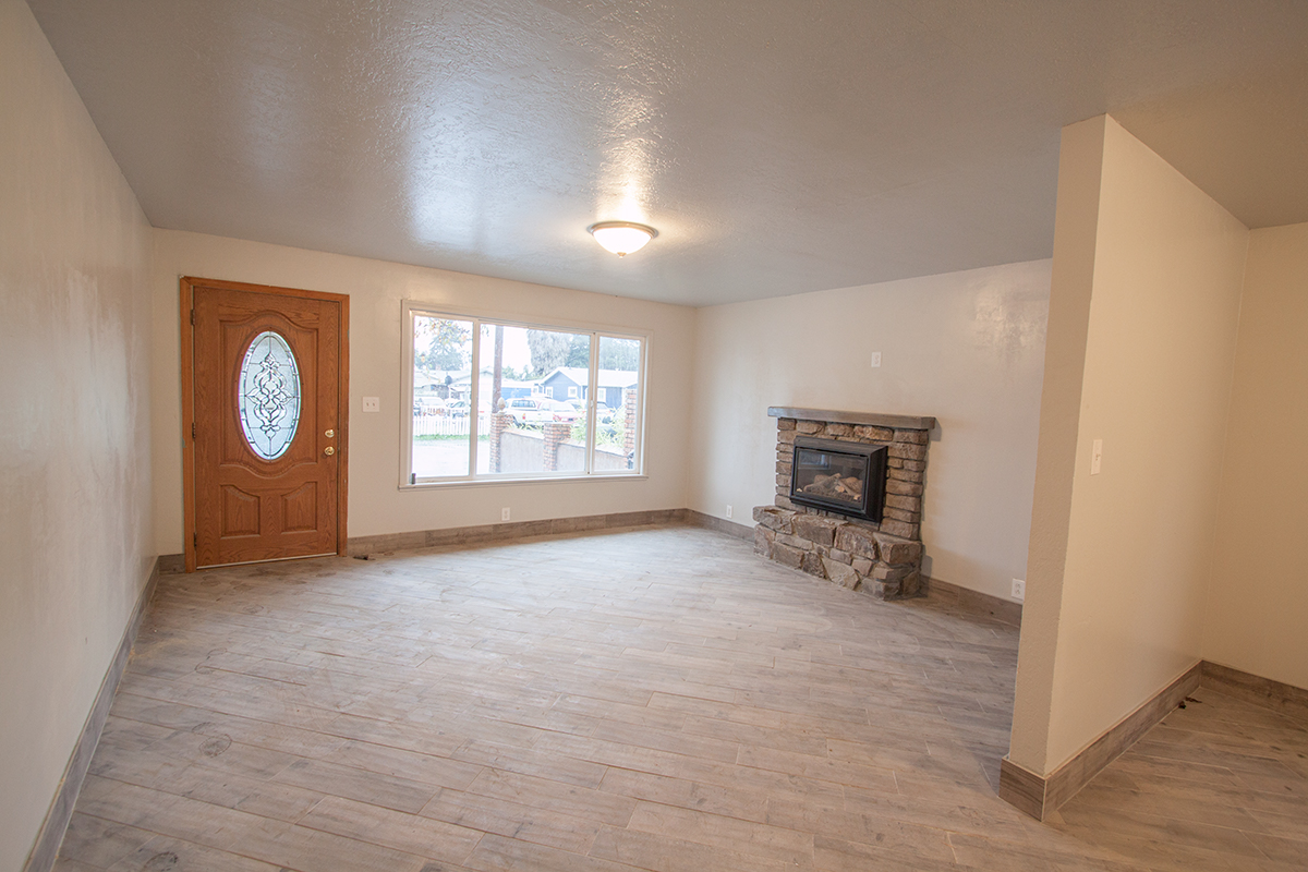 The living room is nicely sized at 14 1/2' x 15 1/2'.  The gas fireplace is wonderful and has a blower for heat if desired. 